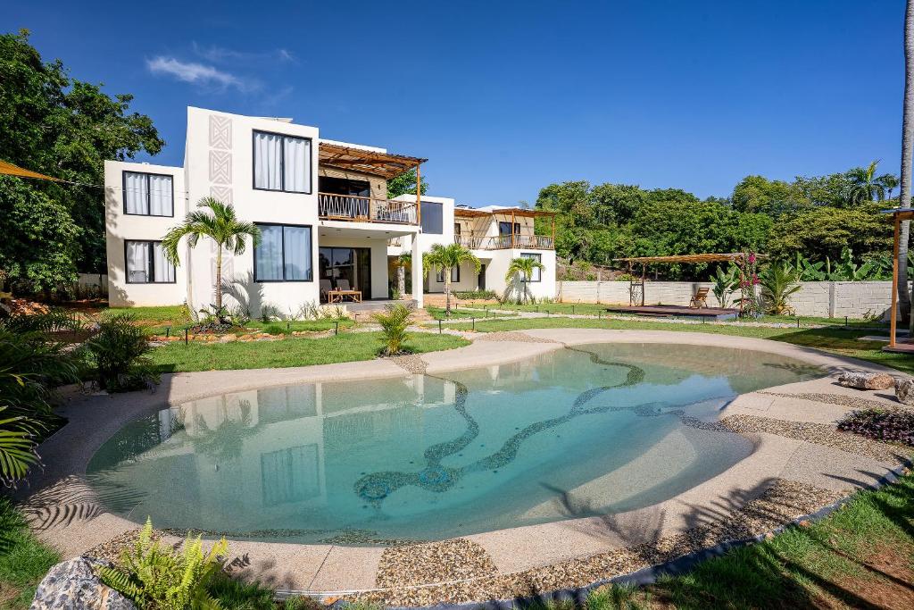 Bazén v ubytování Villavida Boutique Hotel - La Playita nebo v jeho okolí