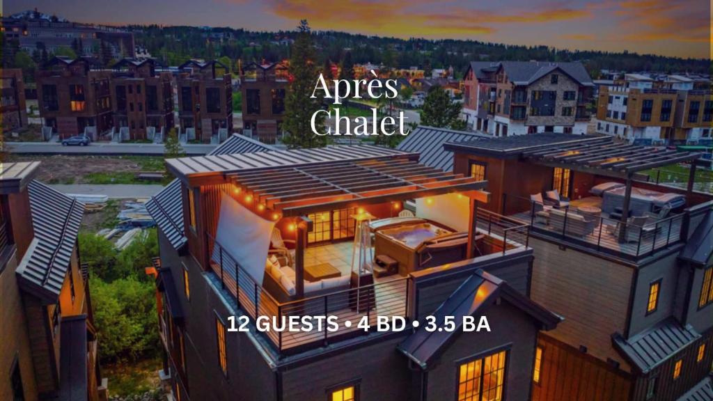 an aerial view of a house with lights on it at Après Chalet in Winter Park