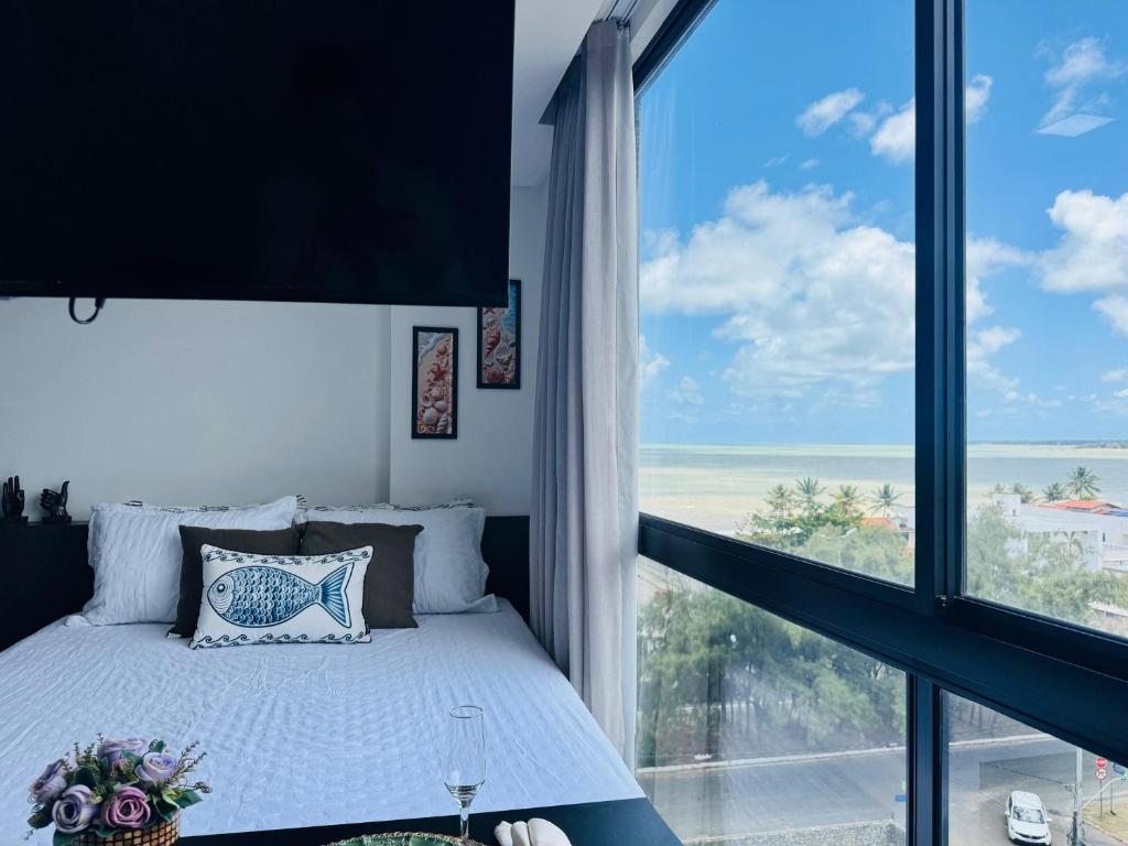Postel nebo postele na pokoji v ubytování Flat602 na cobertura - Luxo Beira Mar Caribessa - vista mar