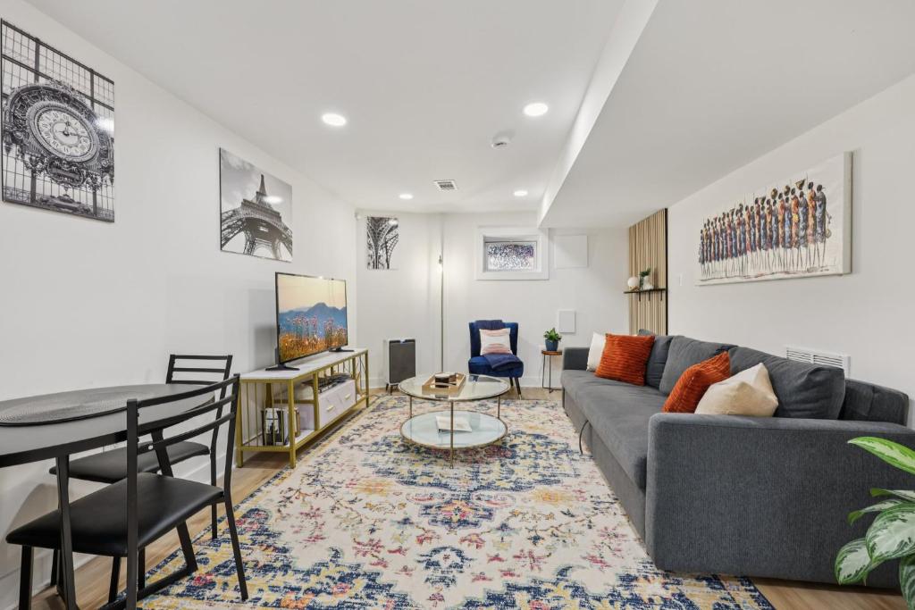 a living room with a couch and a table at City Hopper! in Washington