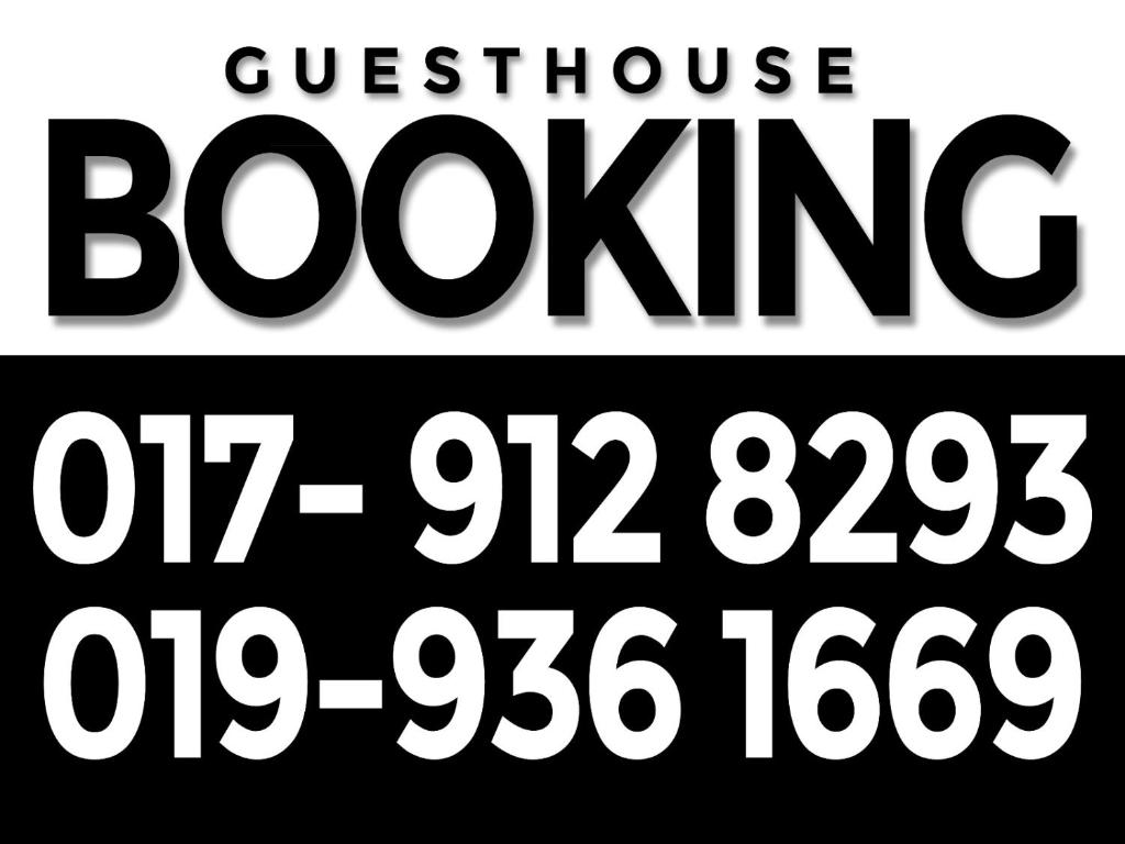 a set of white numbers on a black sign at Rareheart Guesthouse in Kuala Terengganu