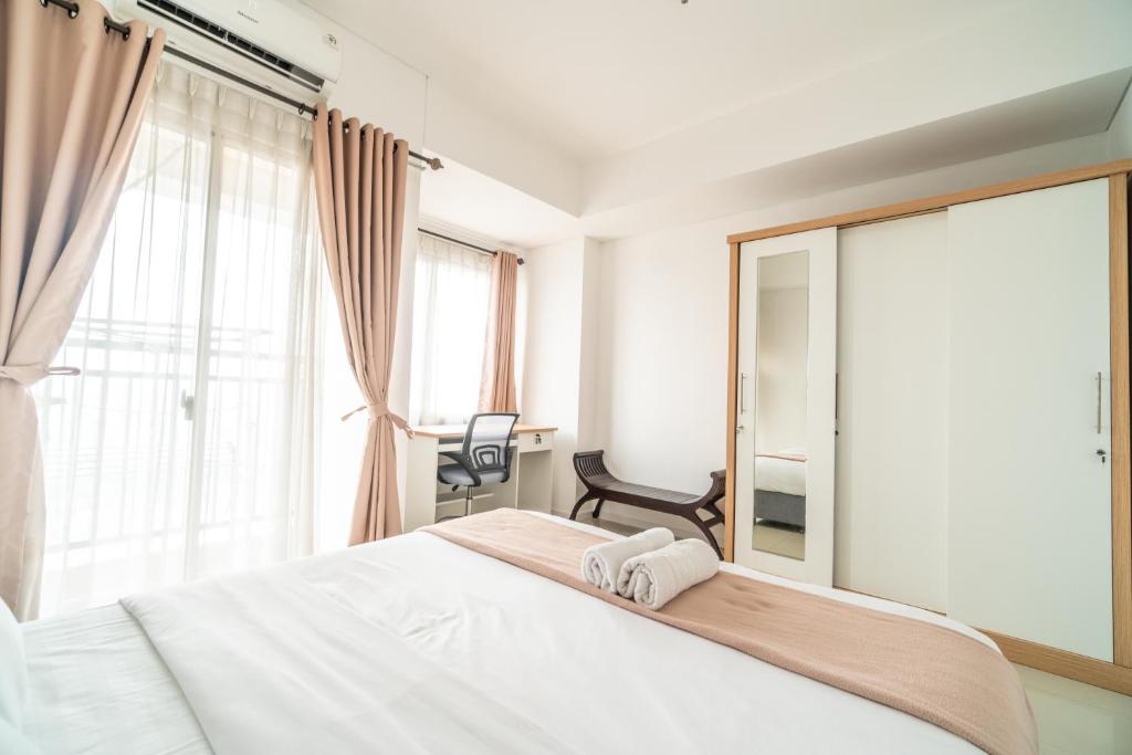 Ένα ή περισσότερα κρεβάτια σε δωμάτιο στο 1-Bedroom above mall thamrin city, Central Jakarta, SCBD