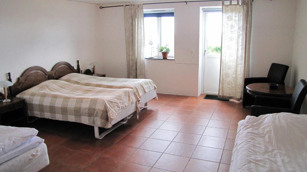 Postel nebo postele na pokoji v ubytování Skönadal B&B