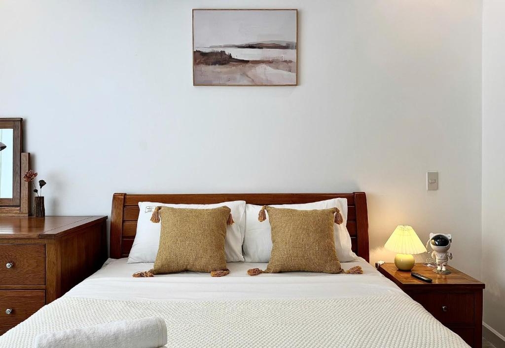 Ένα ή περισσότερα κρεβάτια σε δωμάτιο στο Rù Rì Homestay