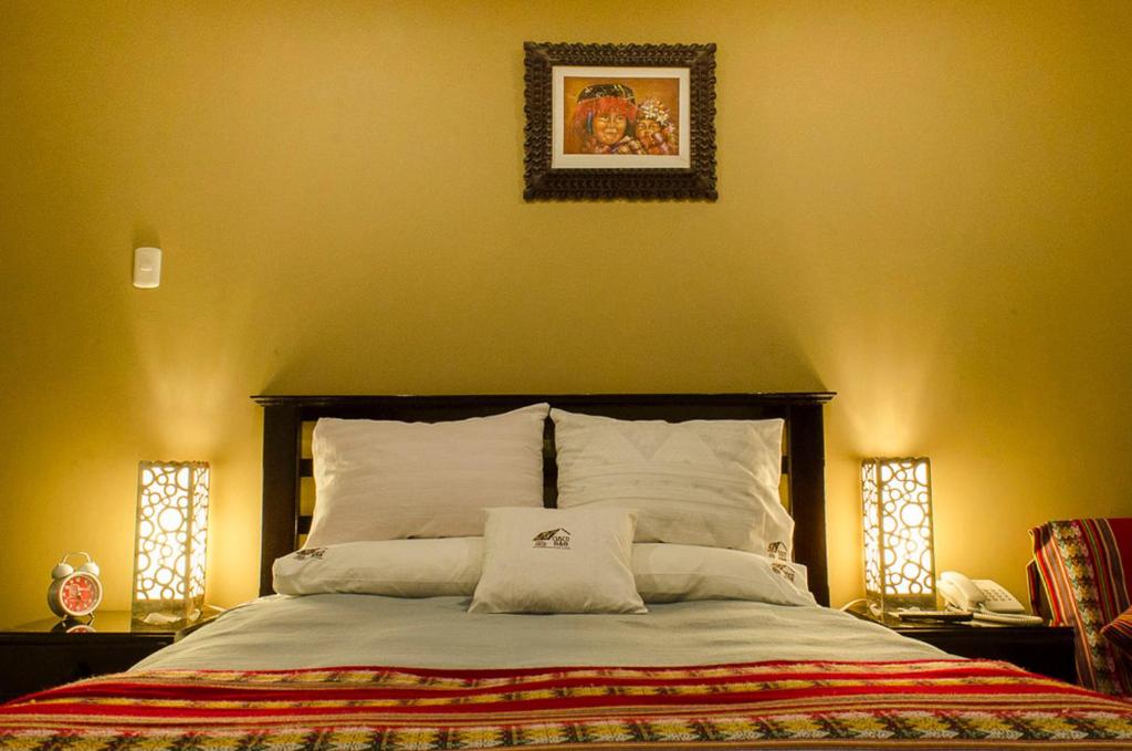 Letto o letti in una camera di Cusco Bed and Breakfast