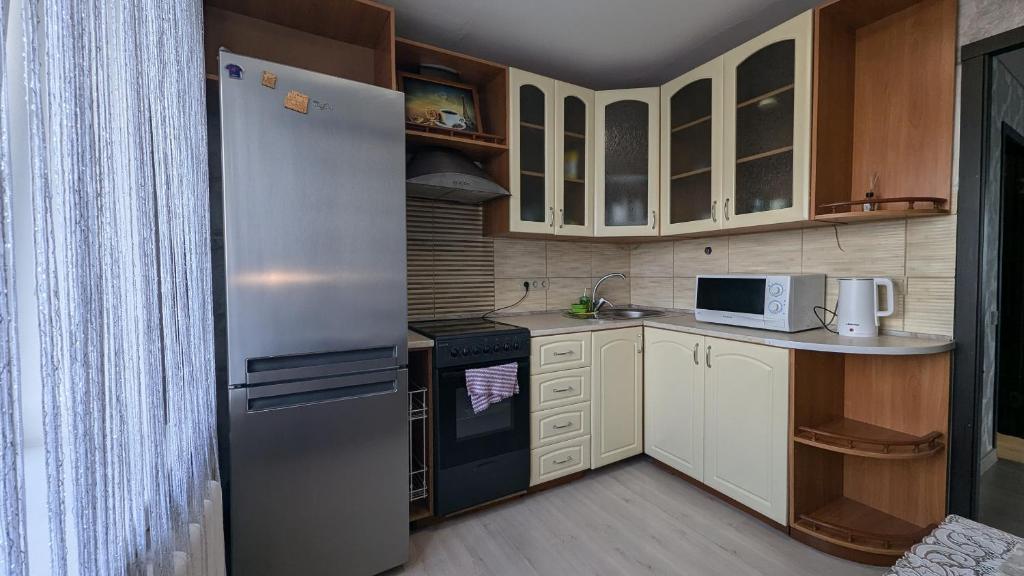 Kuchyň nebo kuchyňský kout v ubytování Видова 2 кімнатна квартира в центрі міста