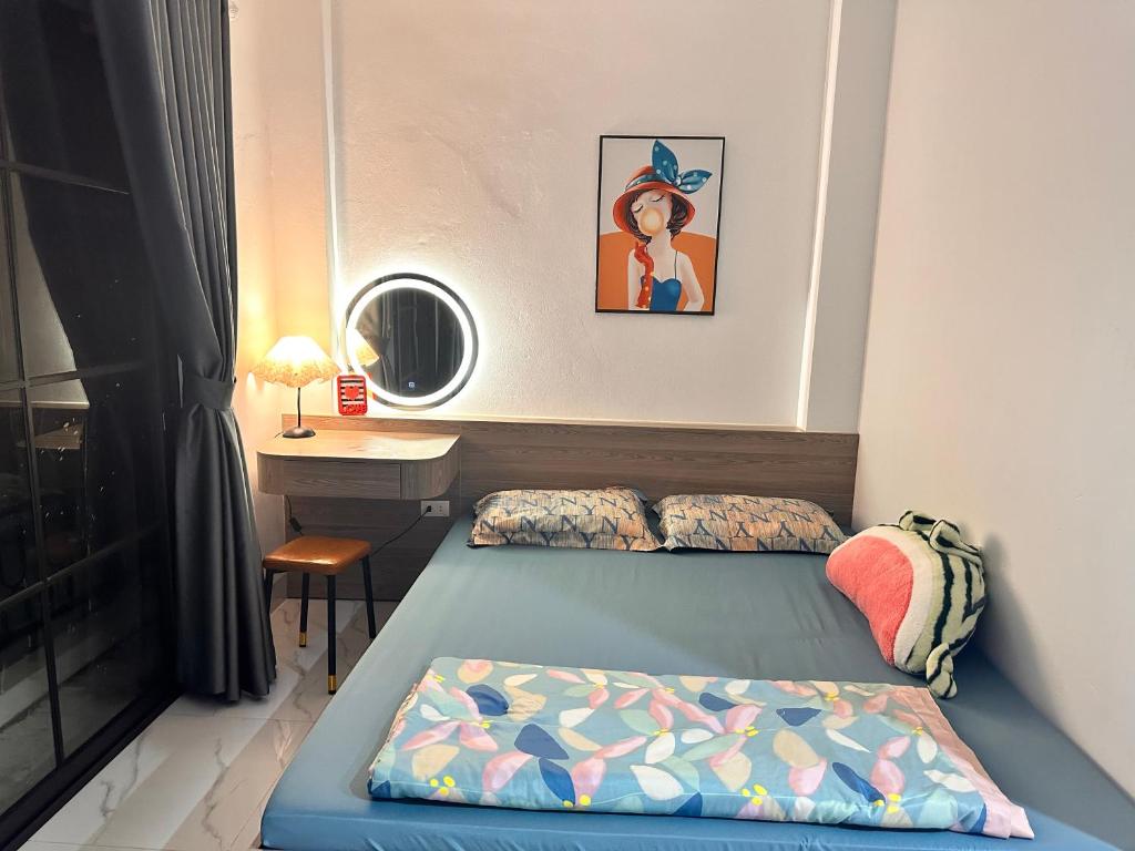 Ένα ή περισσότερα κρεβάτια σε δωμάτιο στο Phương house