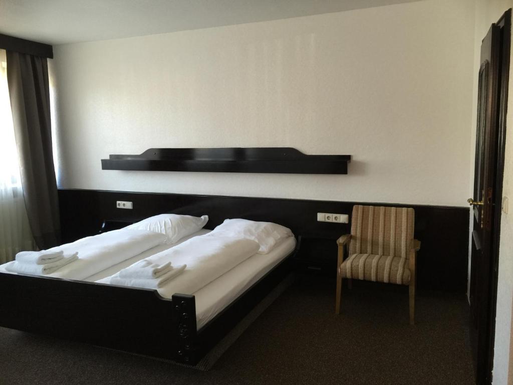 Postel nebo postele na pokoji v ubytování Saigon Hotel