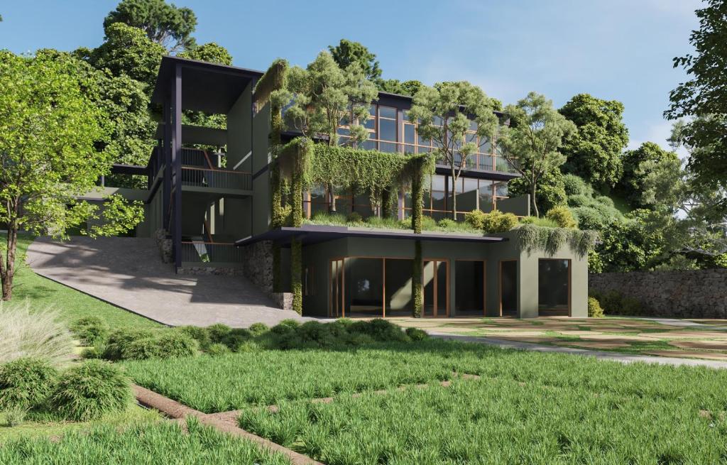 a building with plants on the side of it at vrihee resort in Weligama