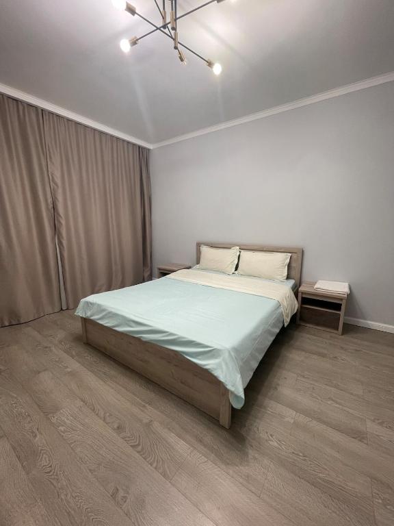 Postel nebo postele na pokoji v ubytování Mega