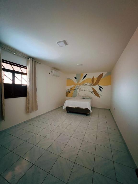 Postel nebo postele na pokoji v ubytování Recanto verano