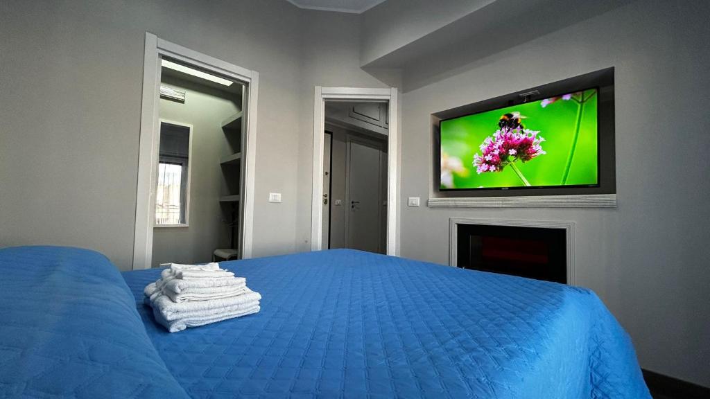 Ένα ή περισσότερα κρεβάτια σε δωμάτιο στο La Casa dello Stretto