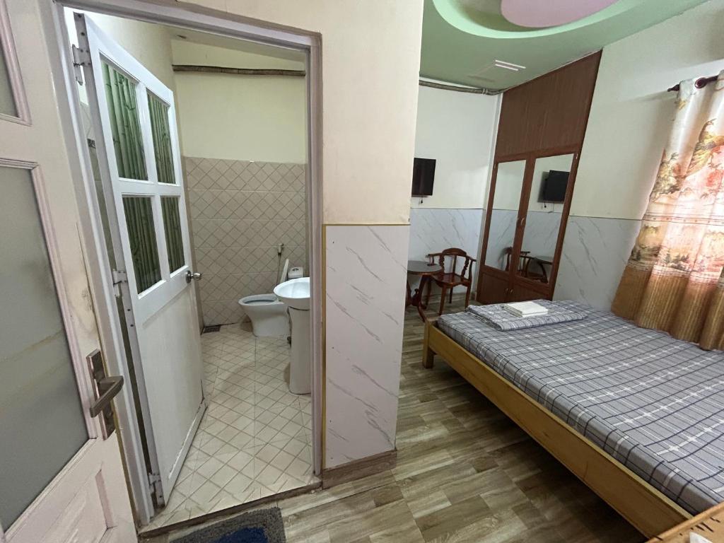 Koupelna v ubytování Nhà nghỉ bình dân