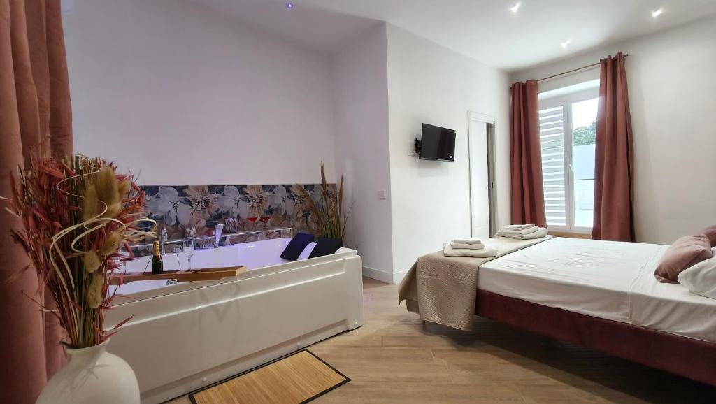 Ένα ή περισσότερα κρεβάτια σε δωμάτιο στο Rooftop14 Suite&Relax