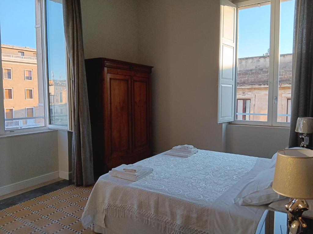 Una cama o camas en una habitación de Dimora Sant'Allegria