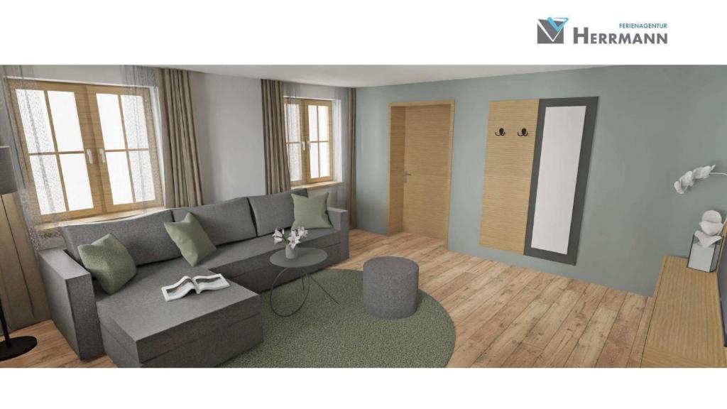 a living room with a couch and a table at Ferienwohnung Beim Paschamarte in Schwangau