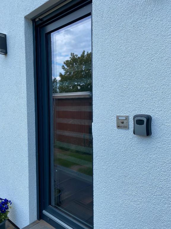 a window of a house with a windowillanceptinptinptinptinptinptinptin at Zum Kölpiensee in Kolpinsee