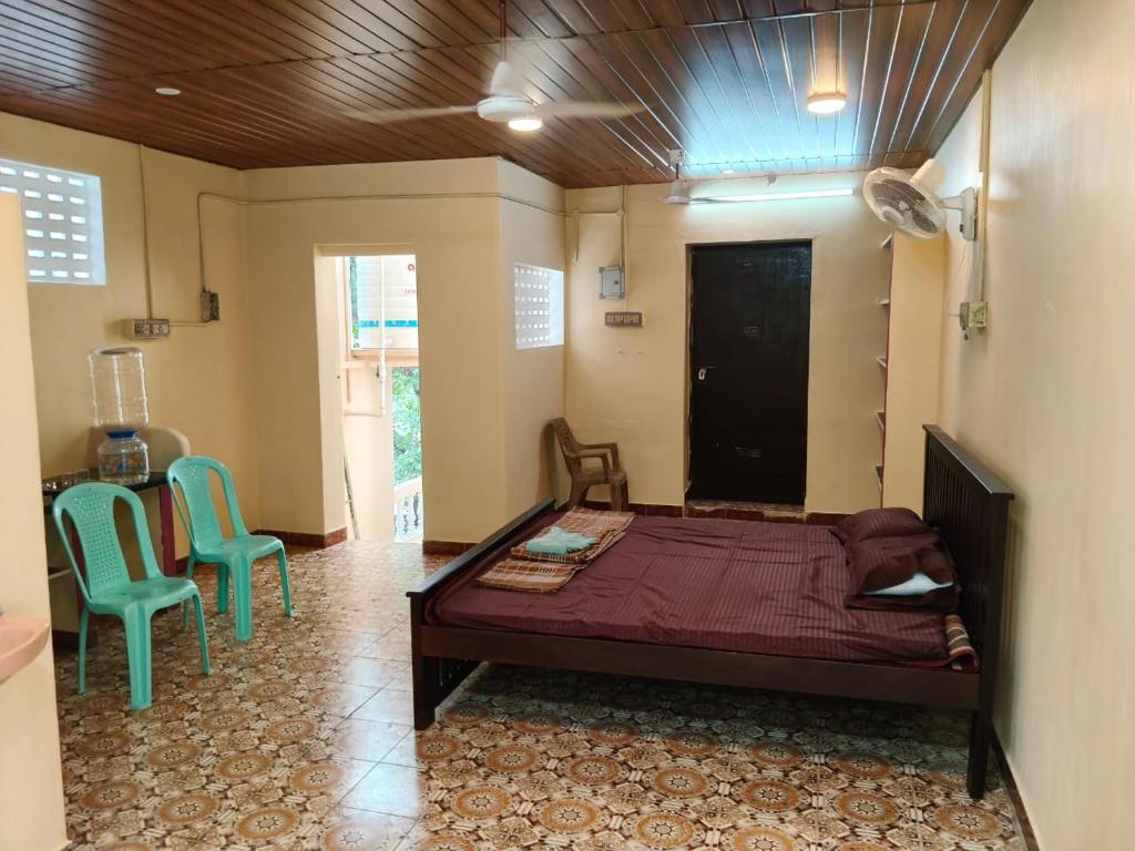 Postel nebo postele na pokoji v ubytování TEN STAY Homes & Independent villa