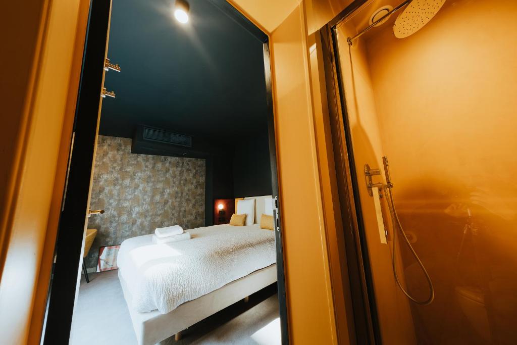 Ένα ή περισσότερα κρεβάτια σε δωμάτιο στο Kouter House