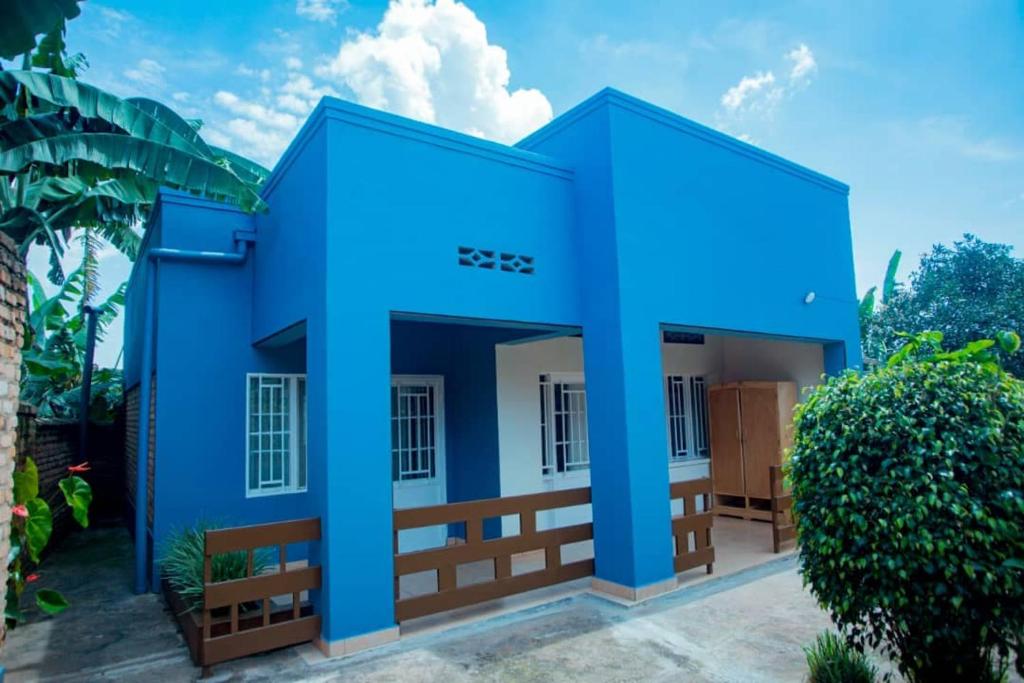 een weergave van een blauw huis bij Cozy 3 bedroom house in Huye