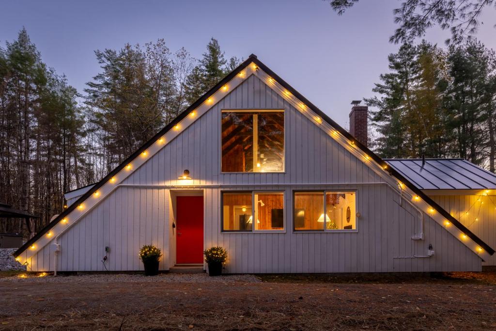 a house with lights on the roof at Stratton Ski Haus in Jamaica