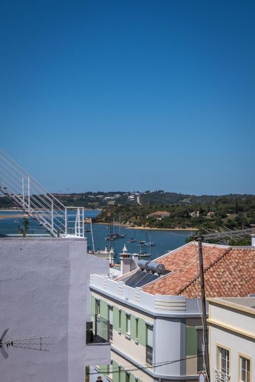 a view from the roof of a building with a harbor at Alvor Ar de Mar Apart in Alvor
