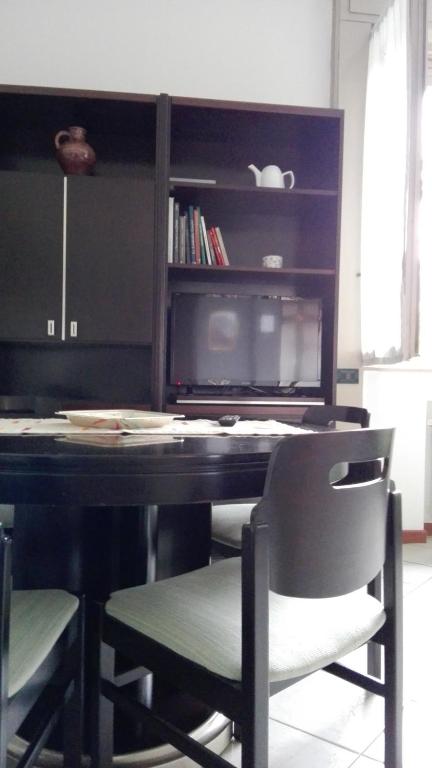 TV a/nebo společenská místnost v ubytování Emi Apartment
