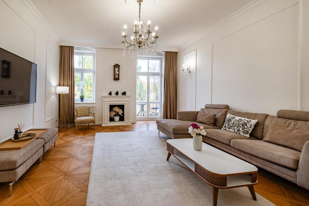 Posezení v ubytování Symphony Apartment