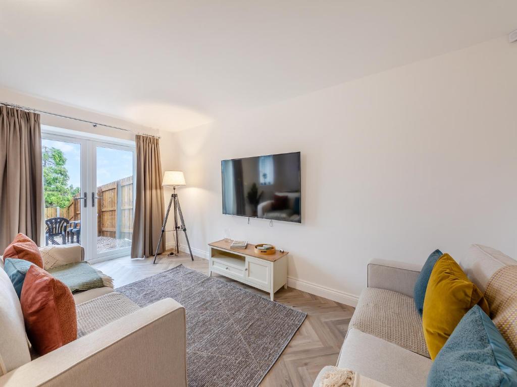 TV a/nebo společenská místnost v ubytování Sandpiper Rest - Uk46781