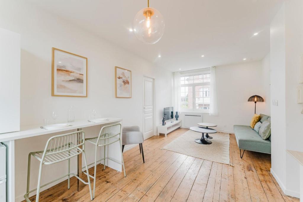 Posezení v ubytování Appartement 1 chambre proche Croisé Laroche & tram