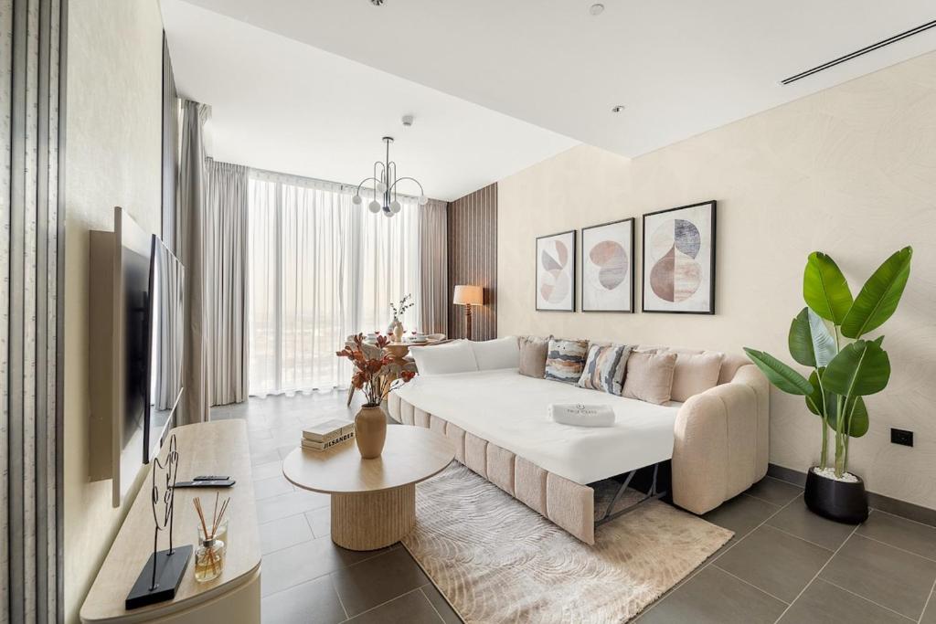 Ένα ή περισσότερα κρεβάτια σε δωμάτιο στο FIRST CLASS 3BR Stylish Luxury Escape