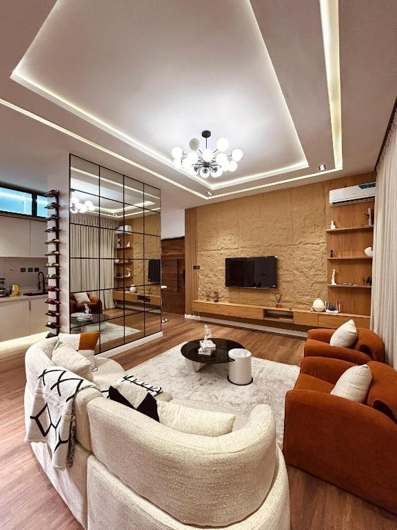 Un televizor și/sau centru de divertisment la Selina Apartment