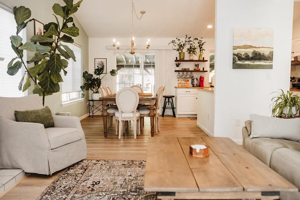 a living room with a couch and a table at The Mintwood 4 BDR Home Near Crater Lake And OIT in Klamath Falls