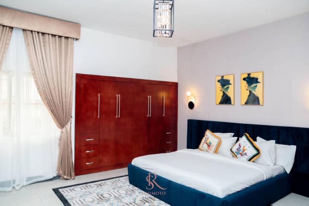 Una cama o camas en una habitación de Sujimotos