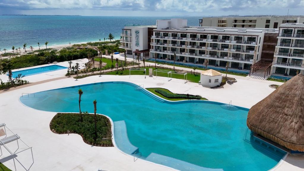 an aerial view of the resort with the ocean in the background at Ocean Allure Costa Mujeres - Adults Only - All Inclusive in Costa Mujeres