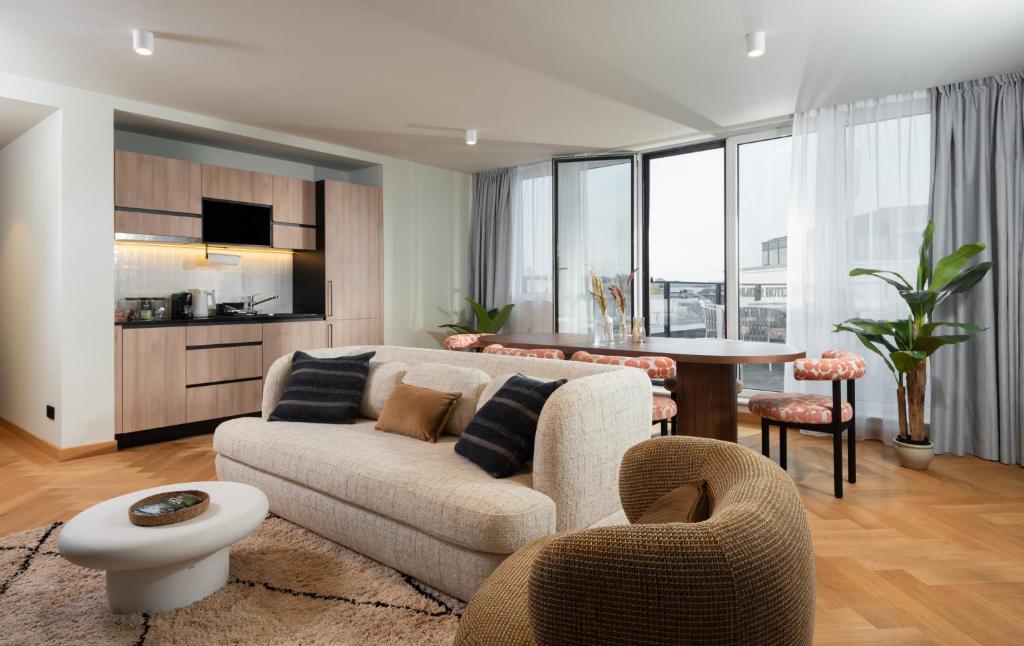 a living room with a couch and a table at master Mirabell in Salzburg