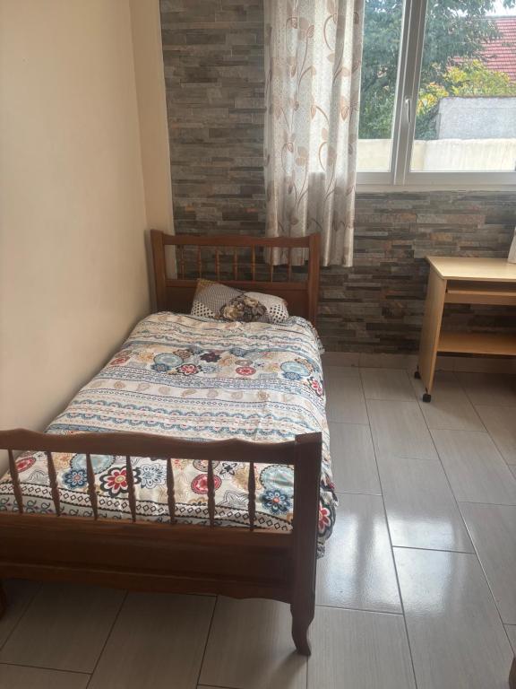 Katil atau katil-katil dalam bilik di Home stay Single room