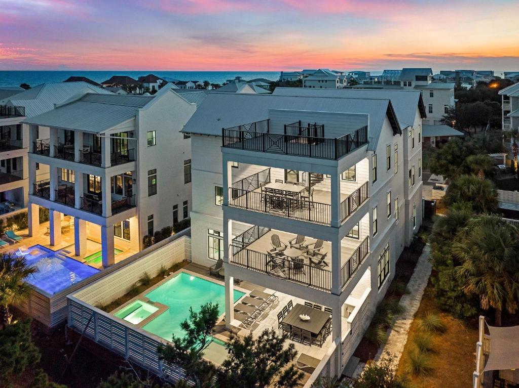 an aerial view of a house with a swimming pool at Oz by The Sea in Inlet Beach