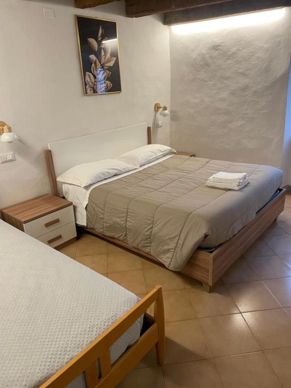 Ένα ή περισσότερα κρεβάτια σε δωμάτιο στο Il Nido di Poppi