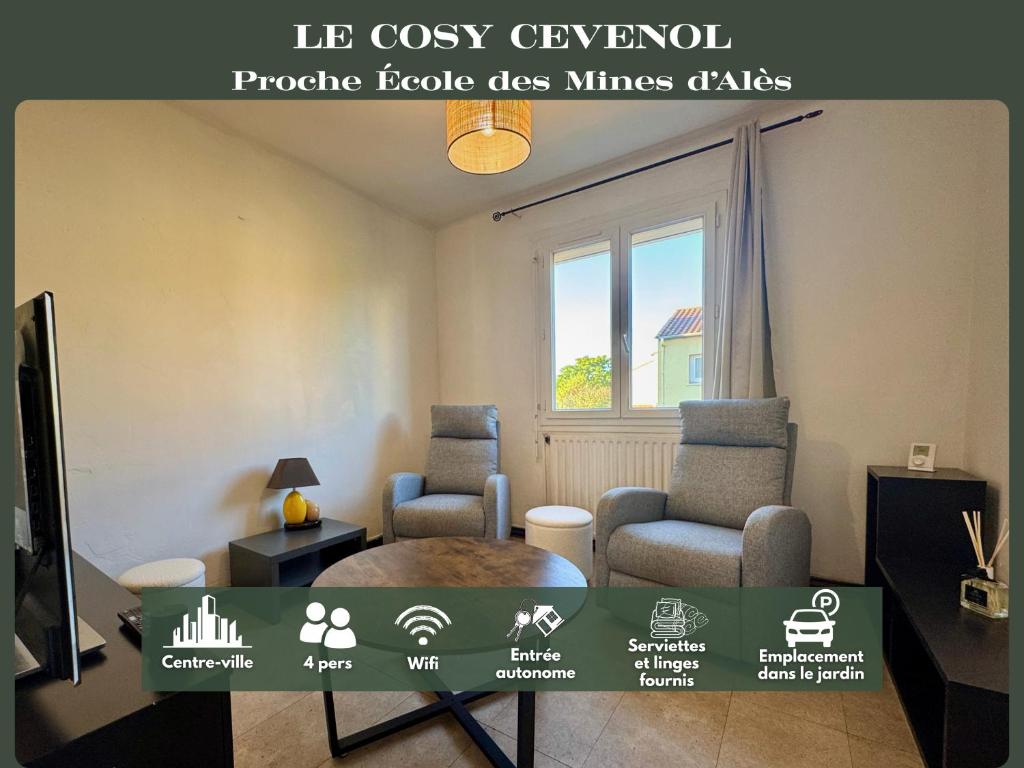 a living room with two chairs and a tv at Le Cosy Cévenol - Jardin et terrasse in Alès