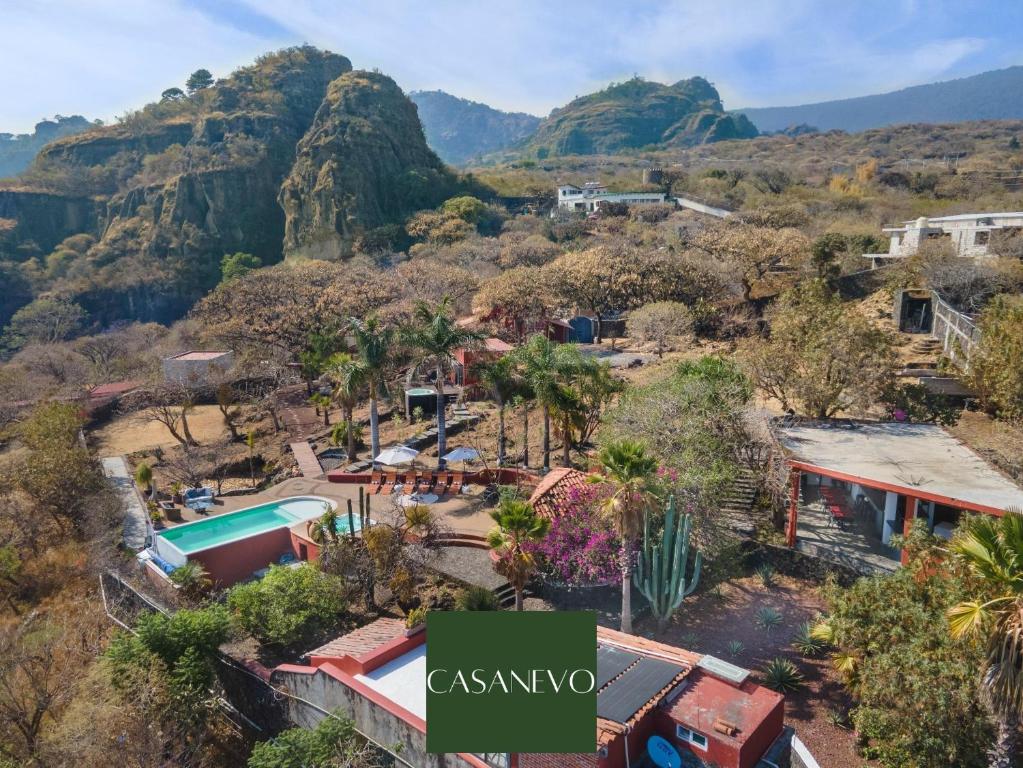 an aerial view of a resort with mountains in the background at Private 5-Bedroom Compound with Pool Tepoztlán Retreat in Tepoztlán