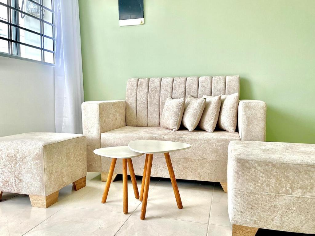 Coin salon dans l'établissement Amalfi Home 2Hab AA