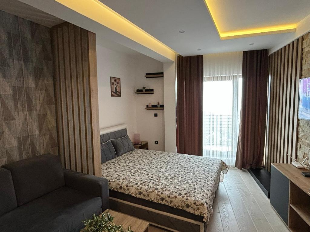 Ένα ή περισσότερα κρεβάτια σε δωμάτιο στο Milmari Bonita Nlux87