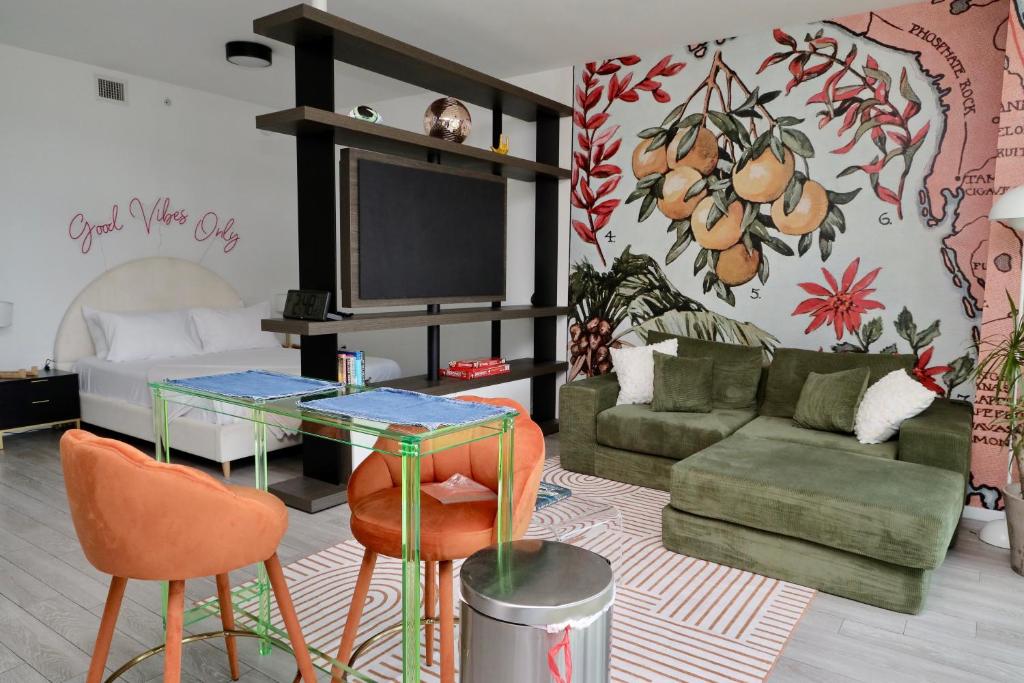 a living room with a couch and a table at Downtown Miami Slice of Paradise in Miami
