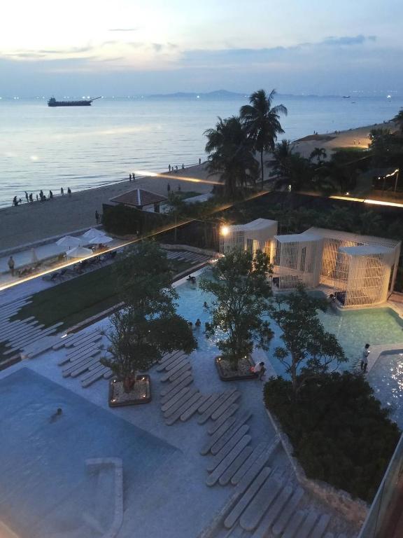 an aerial view of a resort near the beach at Stay with me by Veranda Resident in Na Jomtien