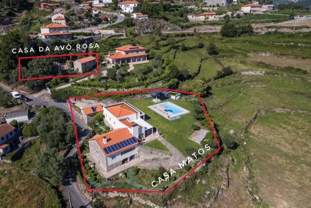 an aerial view of a house with a swimming pool at Matos Casas de Campo in Cabeceiras de Basto