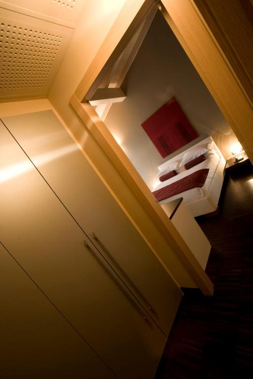 Postel nebo postele na pokoji v ubytování OneMhotel