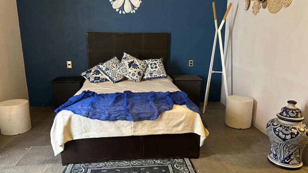 Ένα ή περισσότερα κρεβάτια σε δωμάτιο στο Atelier Monte León
