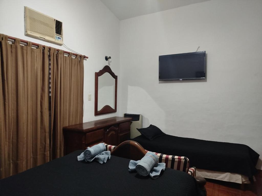 Una cama o camas en una habitación de Chalet " La Maruca "