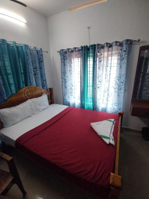 Postel nebo postele na pokoji v ubytování Soul Shore, Varkala